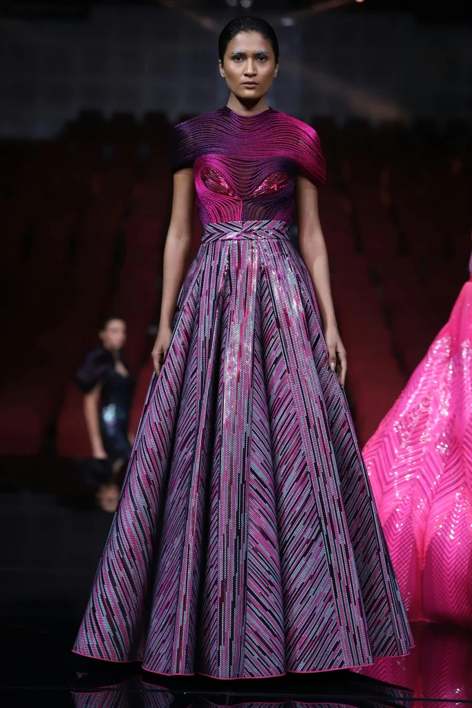 The image displays a woman wearing a luxurious gown. Copyright Rajesh Kumar Verma/Pexels.
