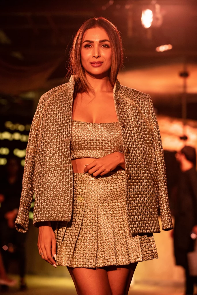 The image displays a woman wearing a jacket, bustier, and mini skirt. Copyright Rajesh Kumar Verma/Pexels.