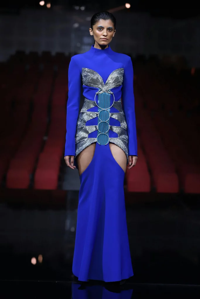The image displays a woman wearing a luxurious gown. Copyright Rajesh Kumar Verma/Pexels.