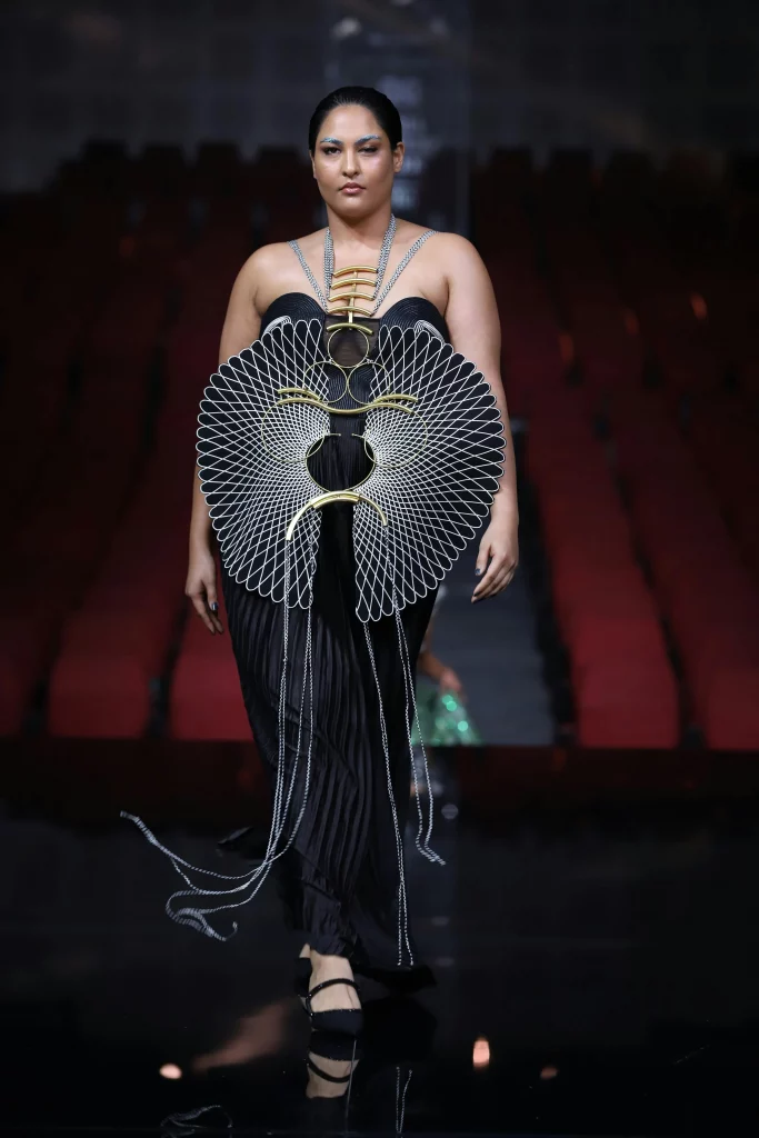 The image displays a woman wearing a gown and mules. Copyright Rajesh Kumar Verma/Pexels.