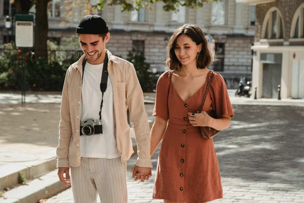 The image displays a stylish couple enjoying a date. Copyright Bethany Ferr/Pexels.